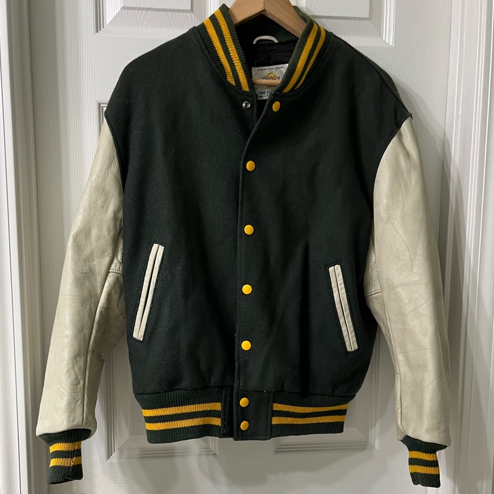 Forest green thrifted varsity jacket. Seems very worn in but in good condition!
